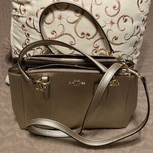 Coach  Christie Carryall